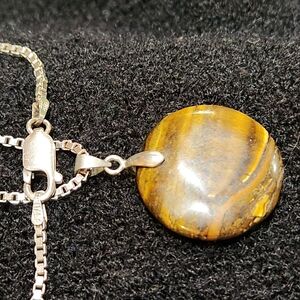 Elegant Gold and Silver Pendant Necklace